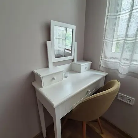 у дома Apartment *